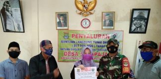 Babinsa Koramil 13/Cisoka Lakukan Pendampingan Pembagian BST